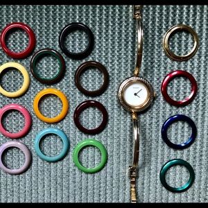 Ladies series 1100 Gold Gucci Watch with 16 bezels